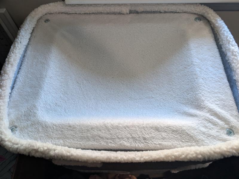 Fabric draped over a wooden frame with no cushion at all