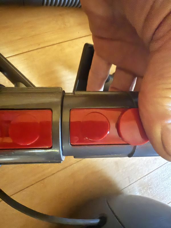 left:Dyson canister animal vac vs right: groom tool