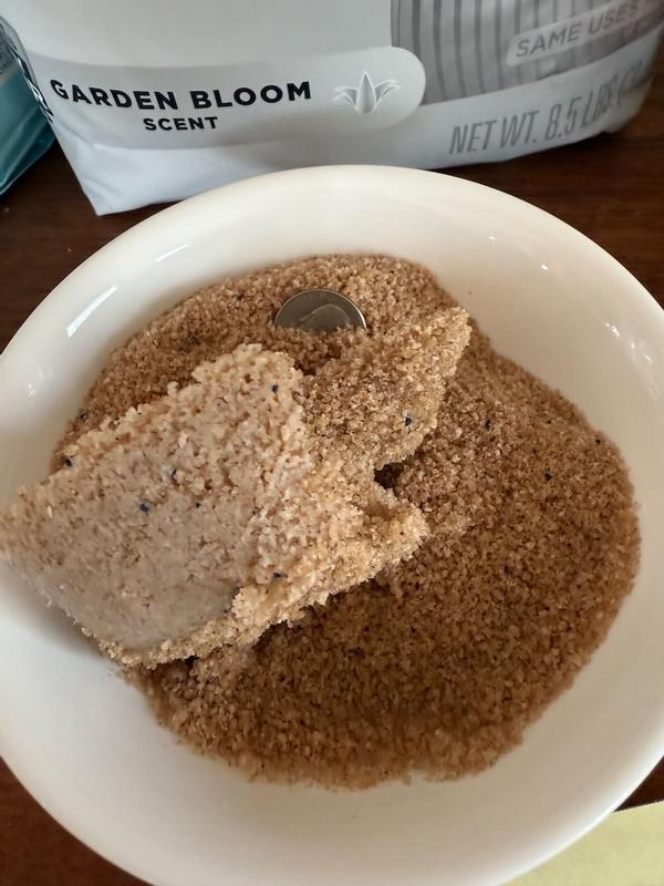 A clump formed from 1/4 cup of water added to the bowl, then lifted