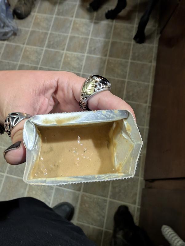 It's very wet looking but then it's thick at the bottom like shredded chicken kind of