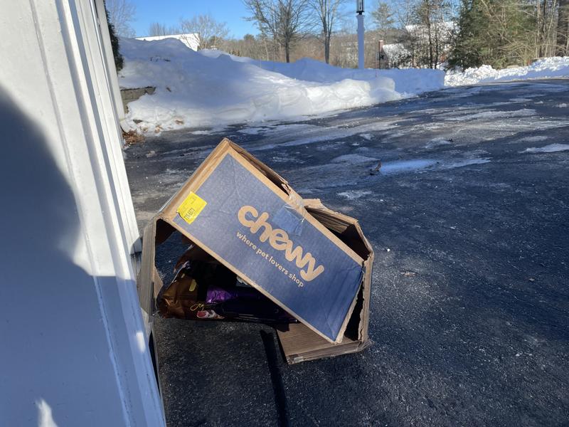 Broken box with contents spilling out