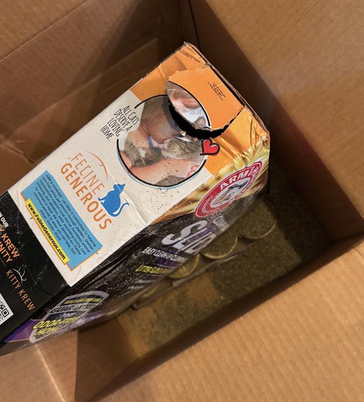Cat litter box was not wrapped in clear plastic wrap and must’ve popped open during shipping
