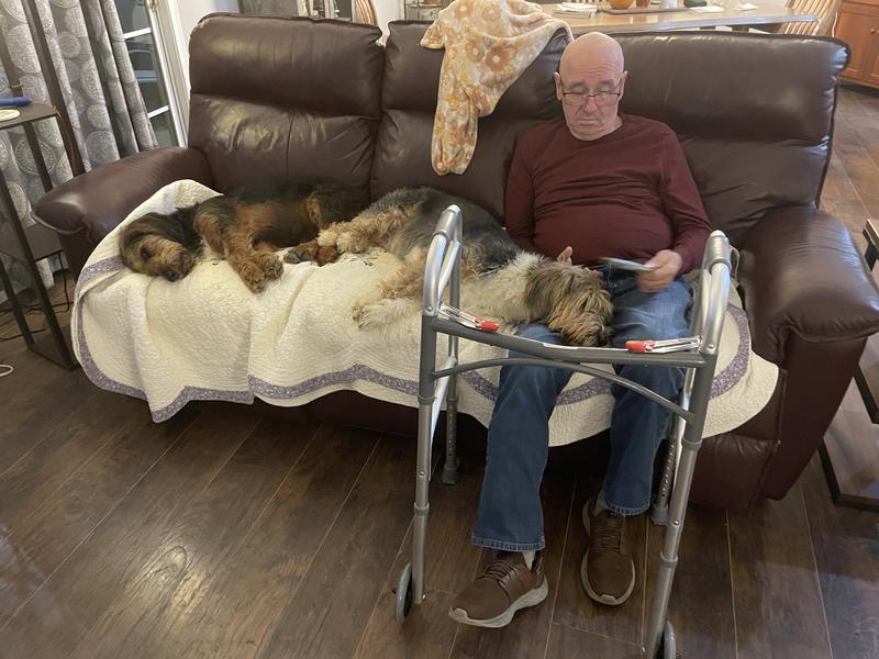 Relaxing with dad after a turkey bite treat.