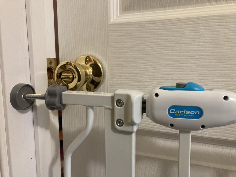 Shows that you can’t latch the door if gate is installed