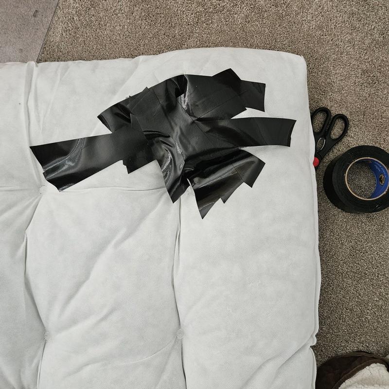 Inner lining showing tape repair