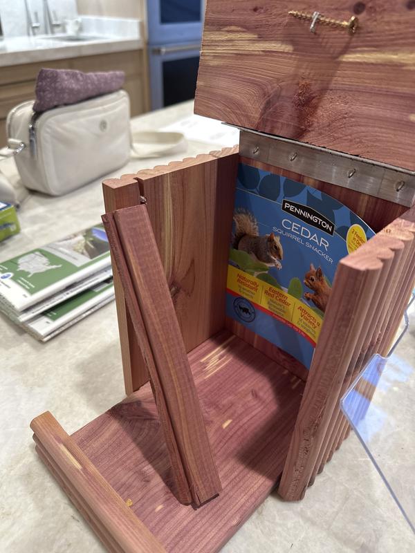 Screw coming through side and piece of wood broke off