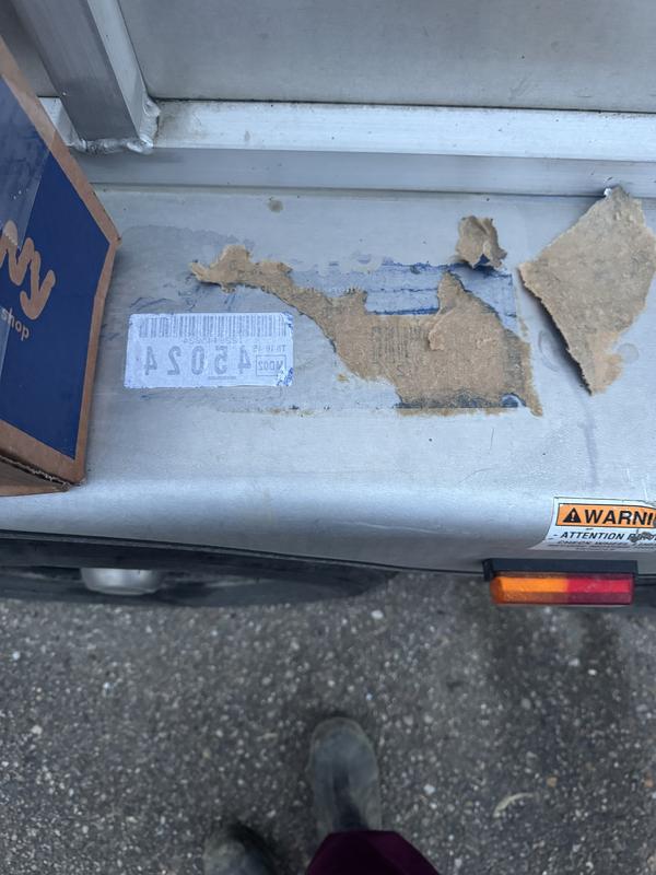 Box left on trailer and residue stuck to it.