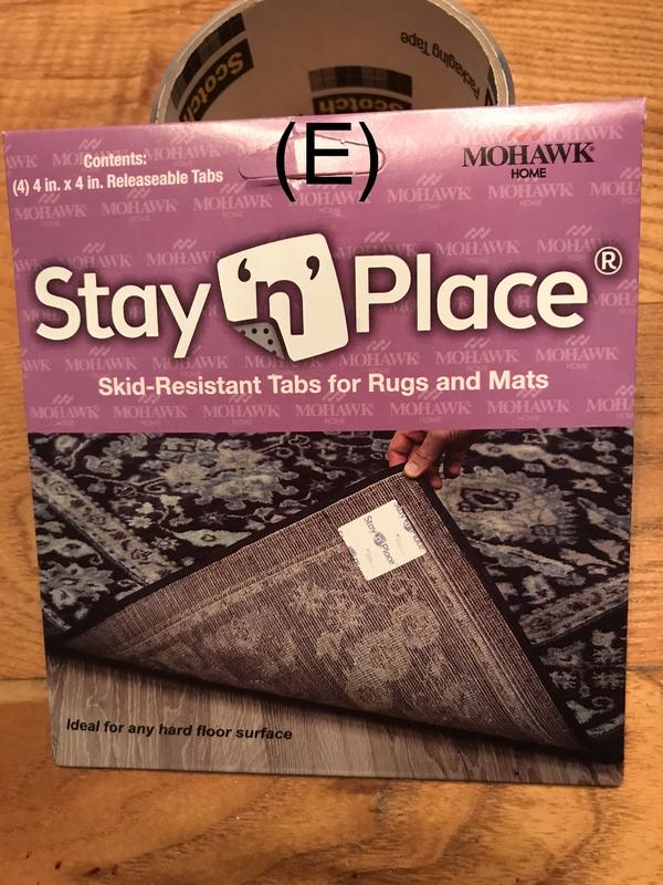 Releasable rug tabs to apply to bases to keep the gates in place.