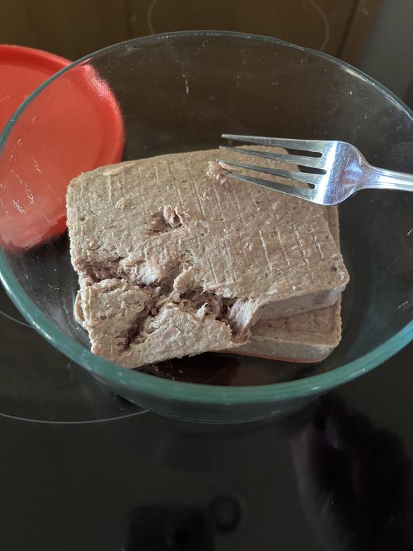 Thawing the frozen patty.