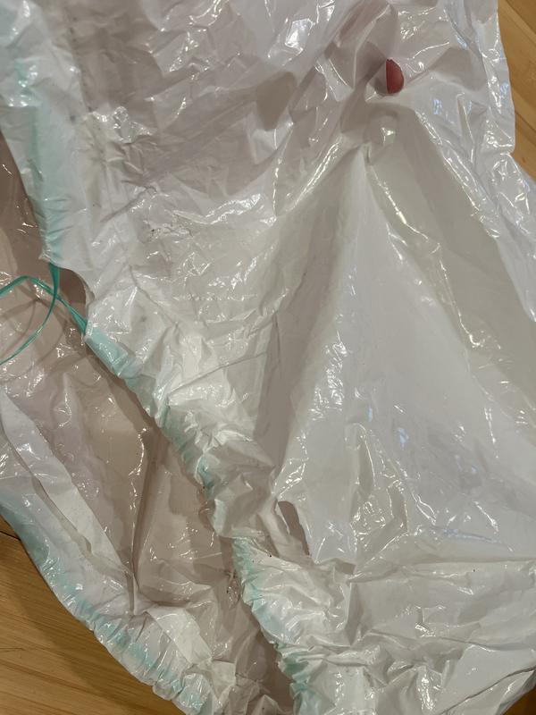 2 holes; one at the bottom of the photo, and the other at the top right corner where I placed my finger because it’s a smaller hole.