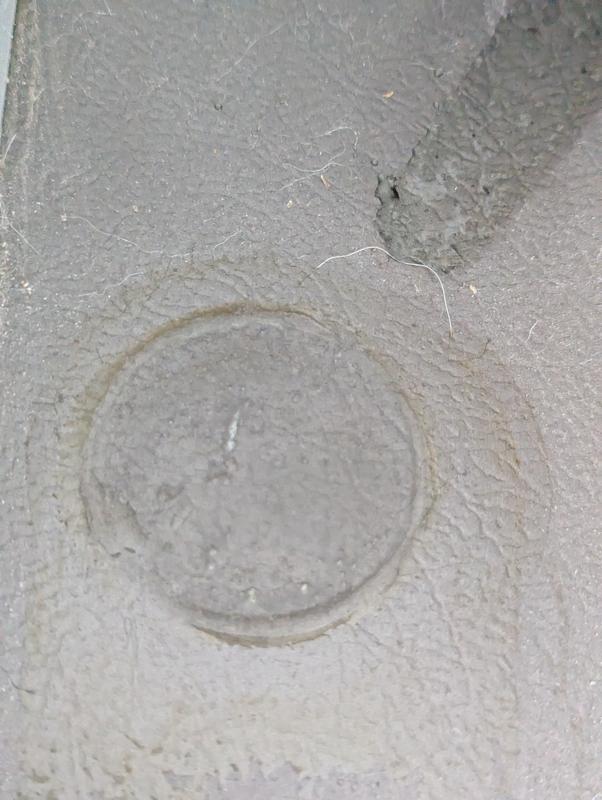 Leaky mess below bottle
