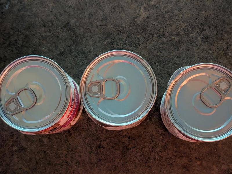 View from top of dented cans & question safety of right can.