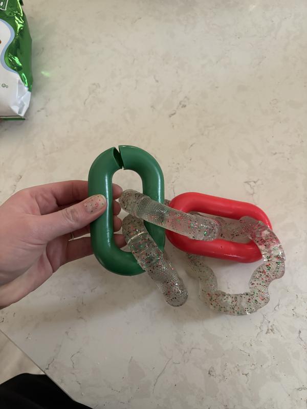 The green and red links are made of a hollow, weak rubber