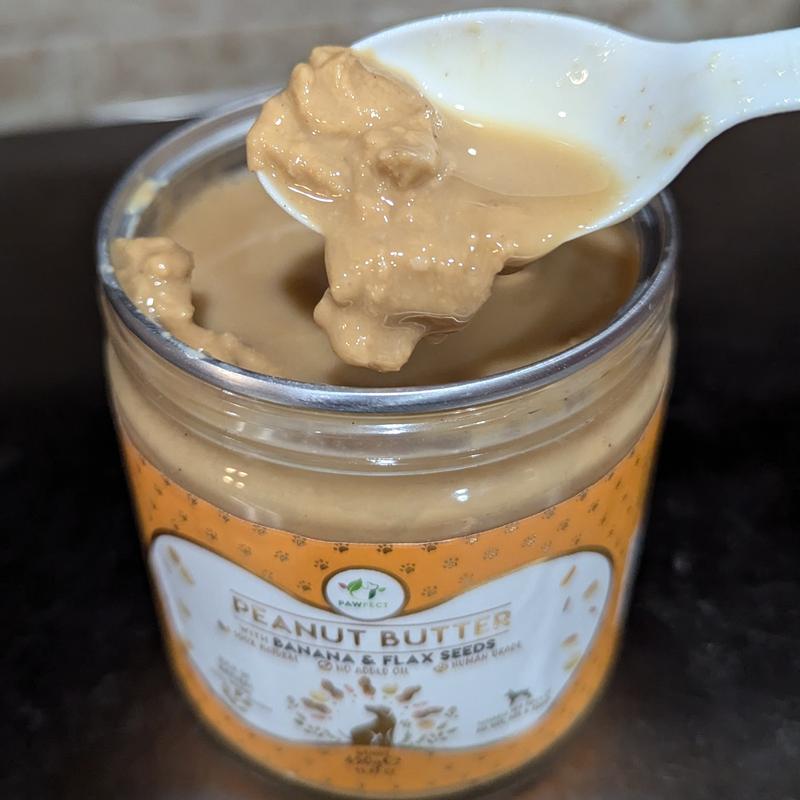 Poured off liquid and hard to scoop out because very firm mass of product under liquid