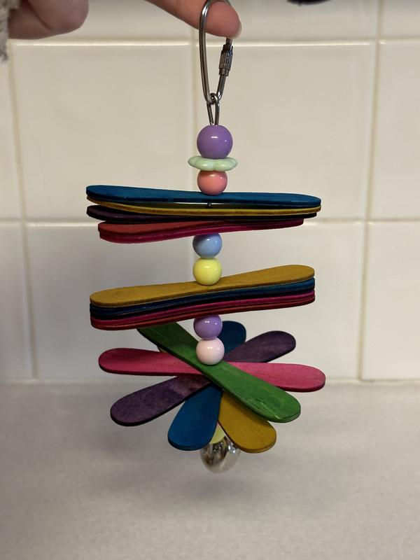 Colorful popsicle toy before my cockatiels wrecked it.