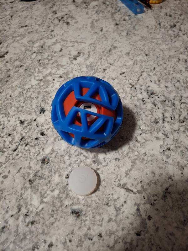 Charging port uncovered - white rubber is the charging cap