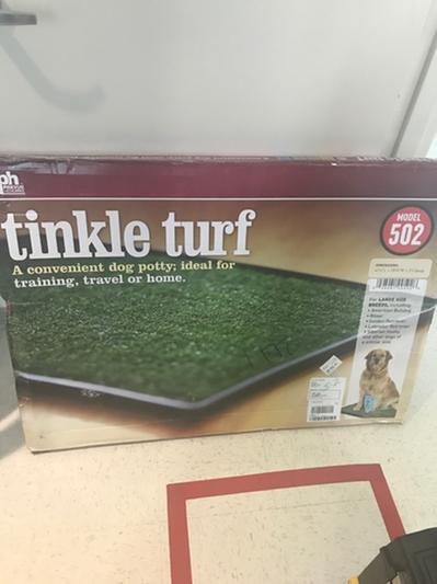 Tinkle turf outlet system for dogs