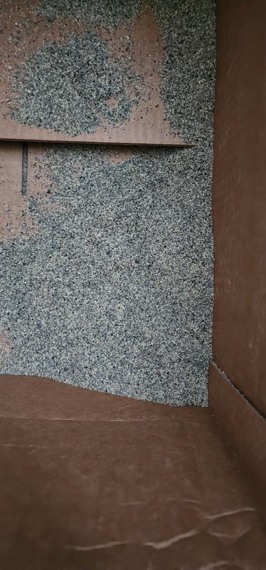 Amount of litter that was left loose in the box even AFTER what spilled onto my floor.