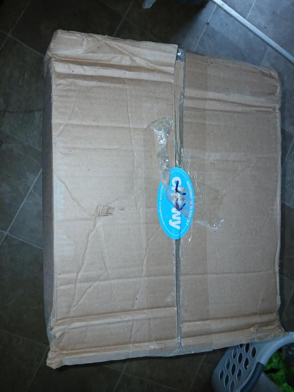 You can’t see it good here but the fedex people had to reattach the tape to the top. They told me that it was completely open when they got it to put on the truck.