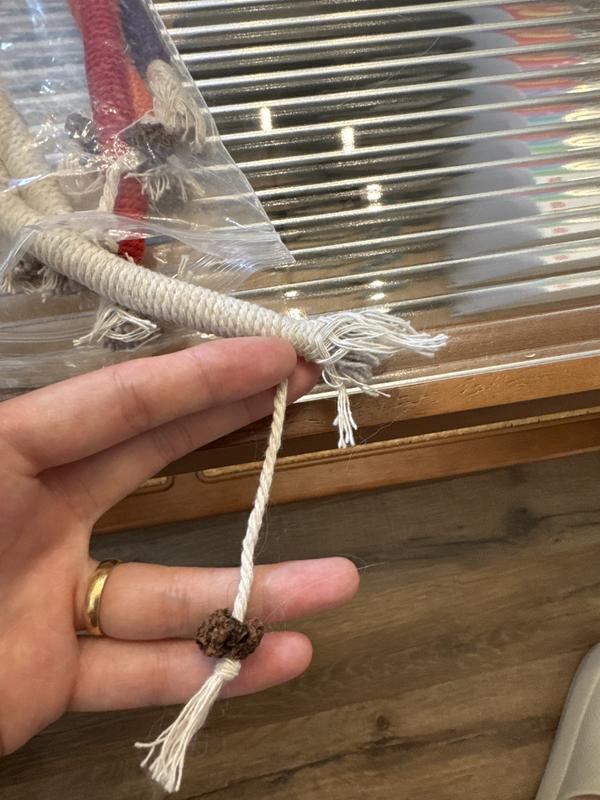 Little string with tiny rock in the end