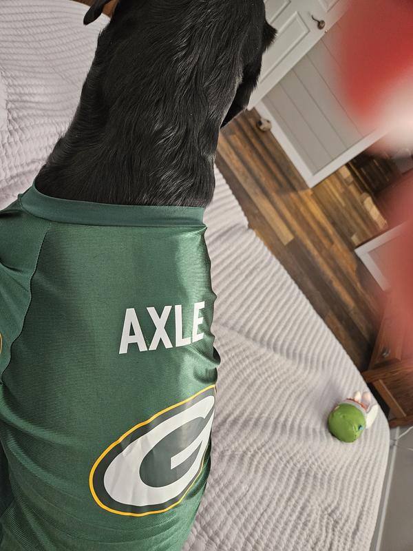Our rescue pup Axle, wearing his Packer jersey