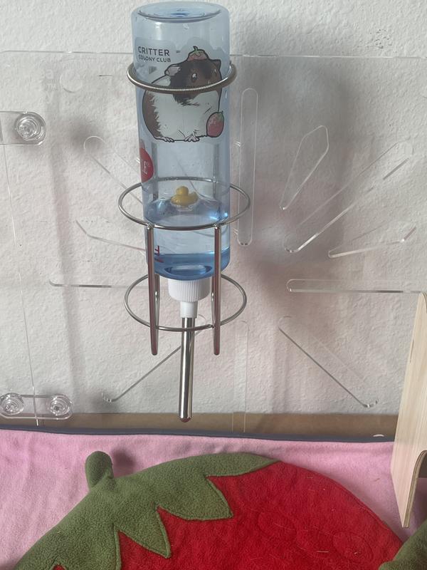 I tried to keep it high with the spring     The included spring didn’t prevent the bottle from sliding down.