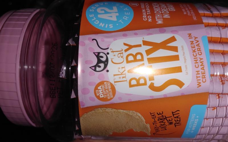 Tiki Cat Baby Stix in canister. They are chicken flavored in creamy chicken gravy.