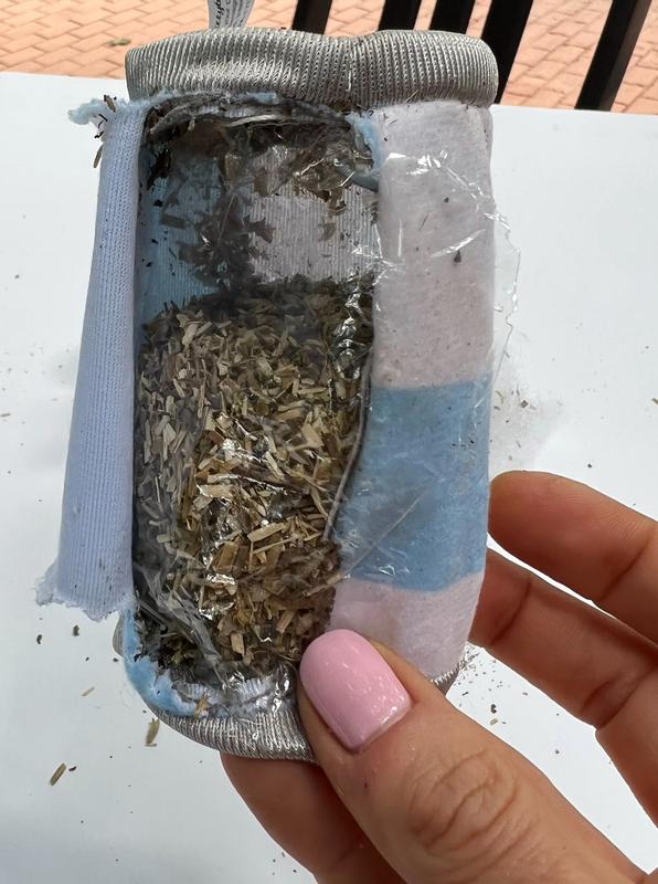 Catnip and fluff is blocked by a barrier of clear stuff that makes noise