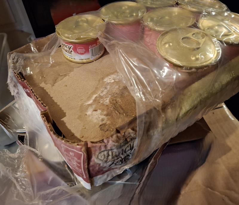 Package looks like it has been in some fluid and it smells.