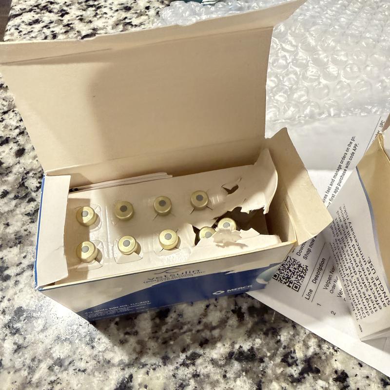 crushed inside the box to a point that the box was opened on the side.