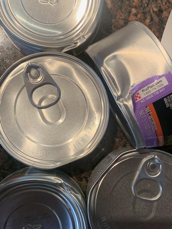 multiple damaged cans