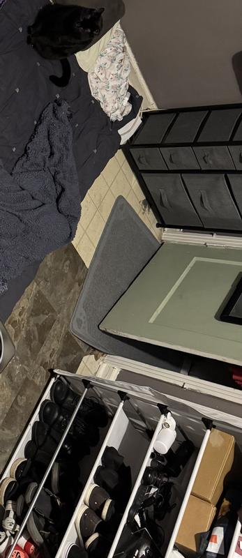 Comes completely halfway out the door and is touching the wall in the other end.