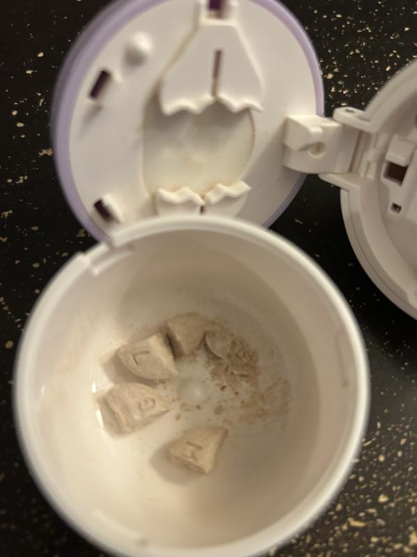 This is after I cut it with a four-way cutter and as you can see, it didn’t equally cut into four pieces there’s still powder left over and one piece doesn’t look right