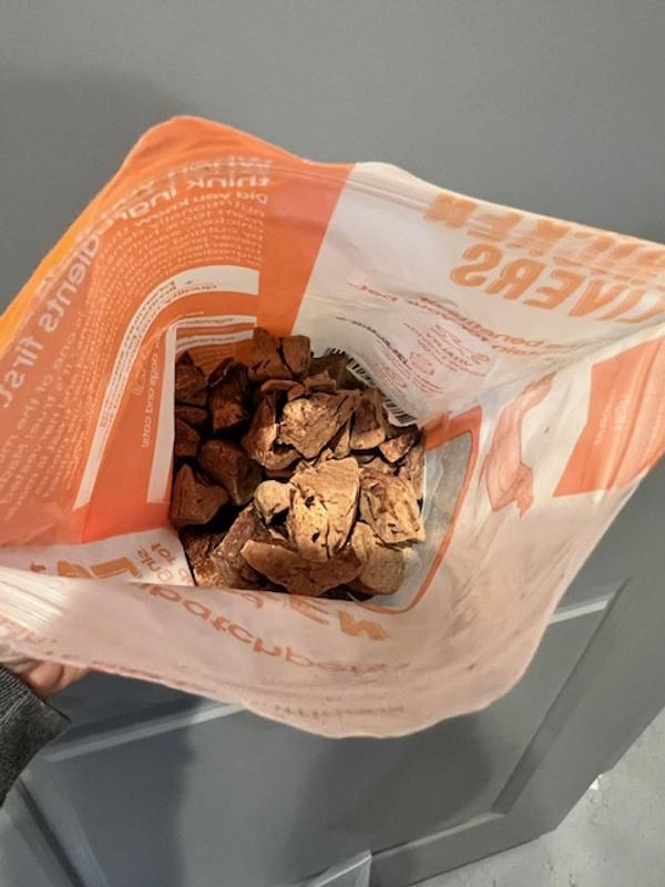 open bag of treats, halfway eaten