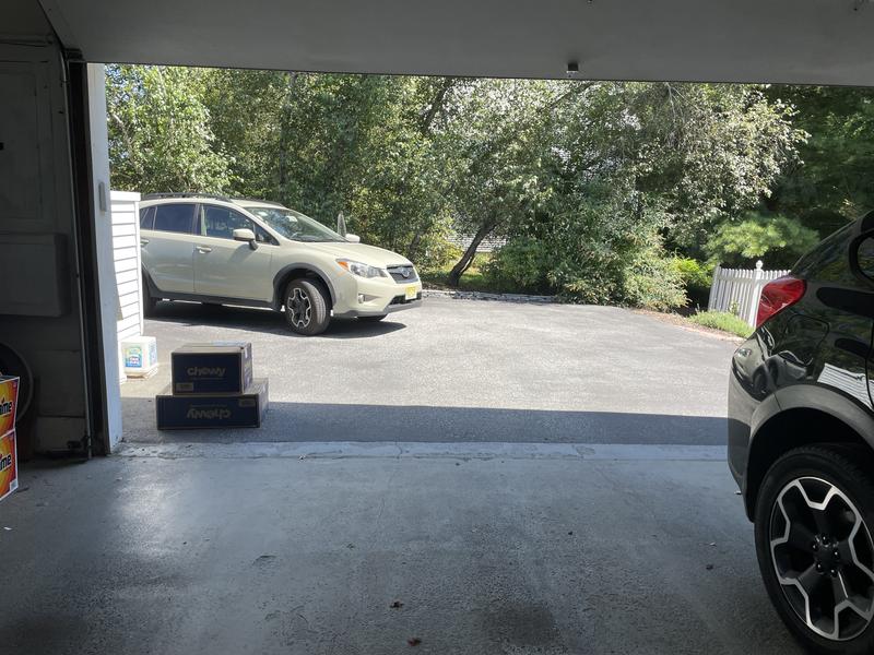 See my husband's car and how small a space to pull into the garage without damaging either of our cars?