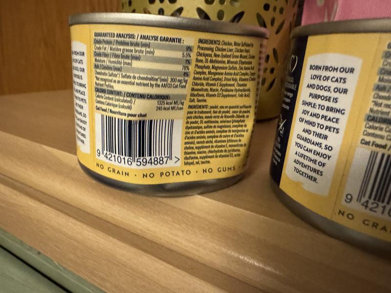 Two of twelve dented cans