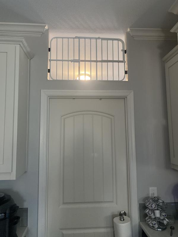 I’m using the gate to keep my indoor kitties away from the cat door for the outdoor kitties