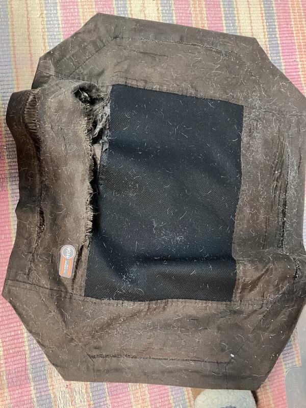 Cot cover with ripped seams