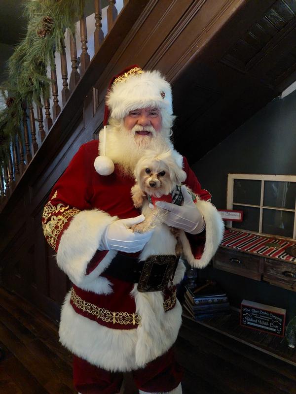 Peeka telling Santa what she wants for Christmas...Cesar please