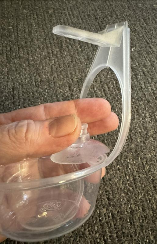 About as thick as the safety ring on a plastic jug...