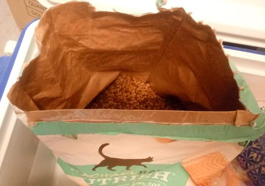 Heavy duty paper bag full of RR kitty kibble.