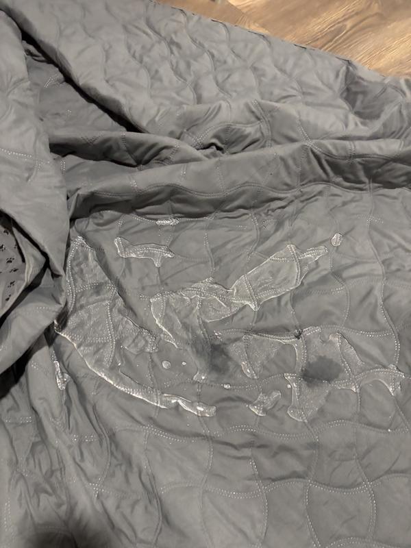 Water pooling on blanket.