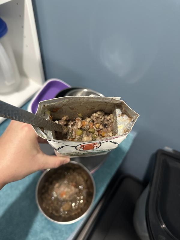 Does not pour out, you must scoop with a spoon