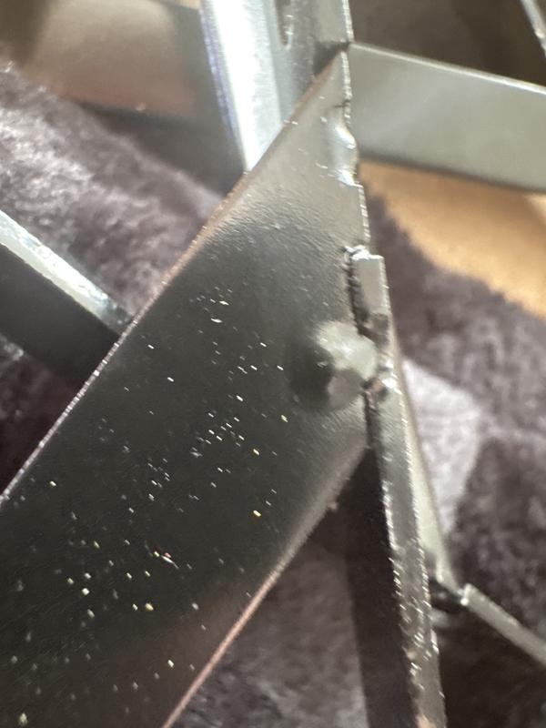 Difficult to tell from the photos, but very sharp unsmooth welding on the brackets