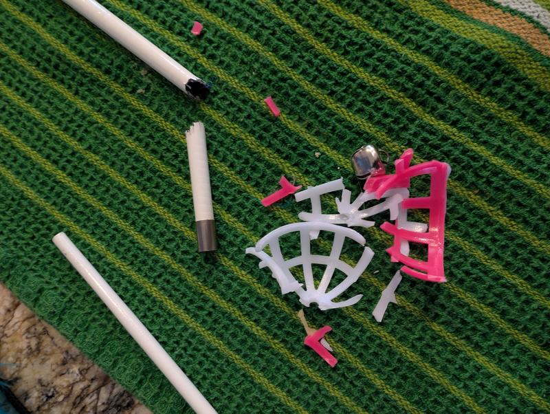 Broken wand and a crushed bell/ball