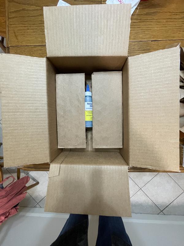 Same open box showing the 4 oz product