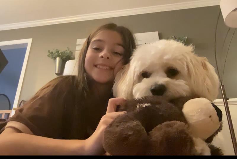 Nikki and Buster with his new plush toy