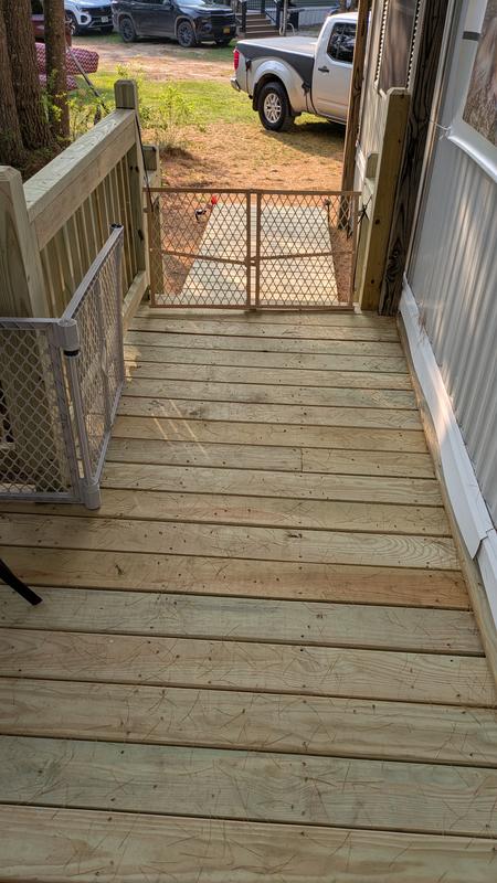 This is a short gate we used while setting up the barrier system.  The taller one is perfect here.