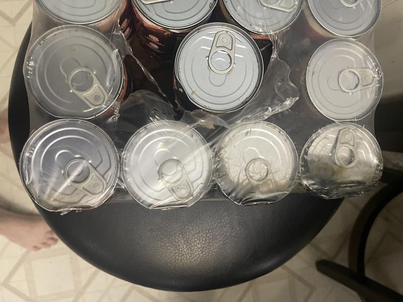 Bad cans, opened during shipping