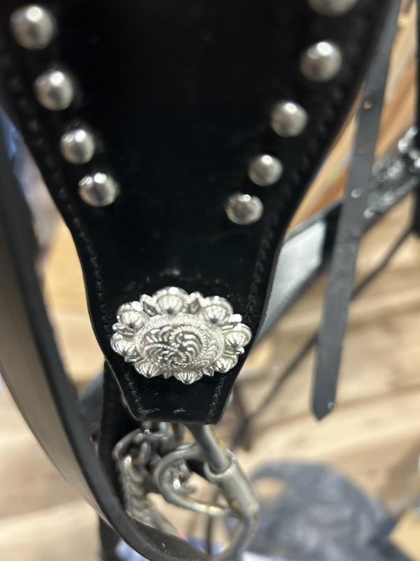 Feels like plastic conchos. Definitely won’t hold up.